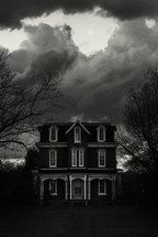 house under cloudy skies 