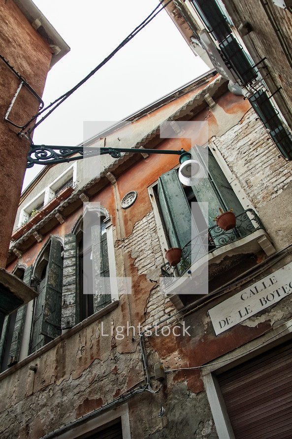 shutters on windows of old buildings in Venice 