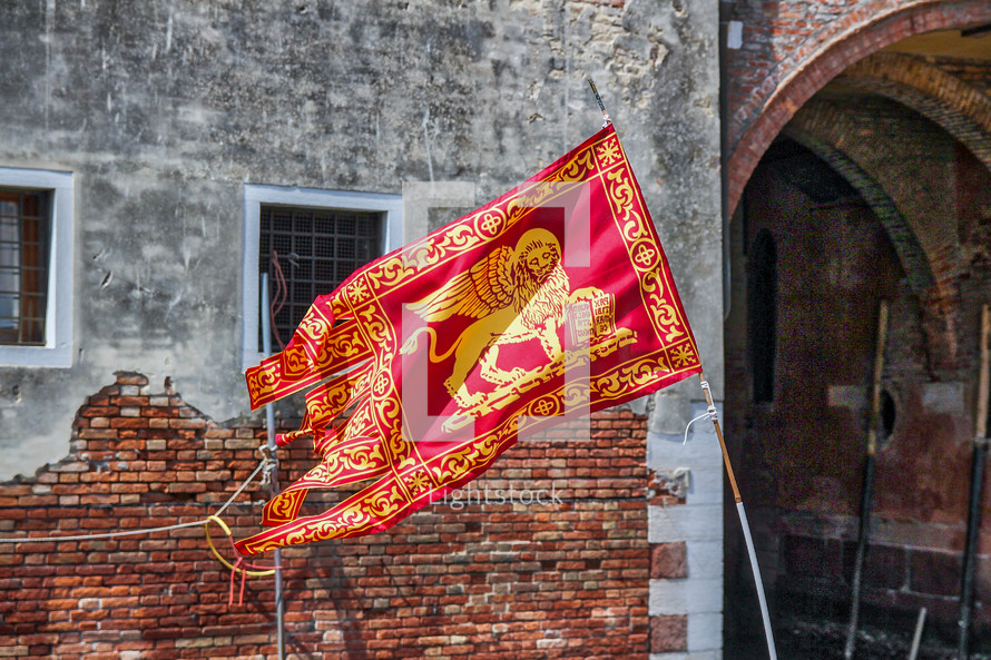 gold and red flag with a Lion in Venice 