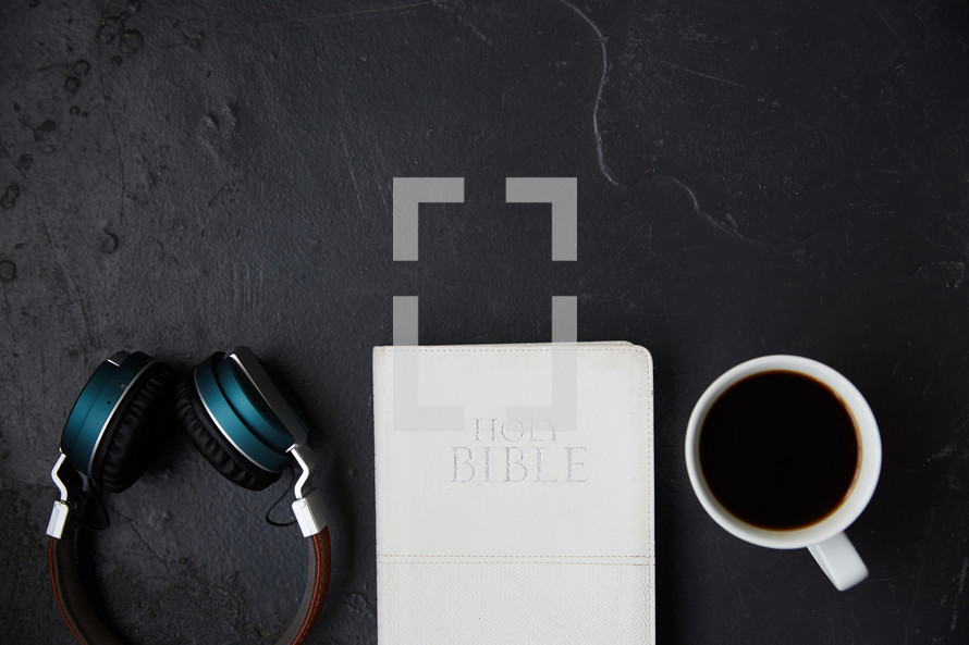 headphones, Bible, and coffee cup 