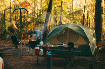 tent and picnic table in a camp grounds 