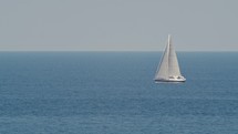 Sailboat sails in the sea