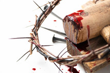 Bloody nails, crown of thorns with drops of blood over white background. Good Friday, Passion of Jesus Christ. Christian Easter holiday. Crucifixion, resurrection of Jesus Christ.