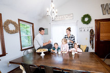a family having cookies and milk 