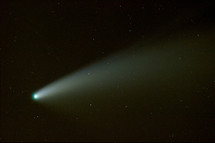 A comet in the clear desert sky