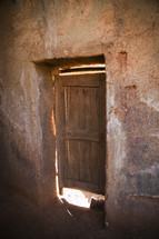 door to a clay house 