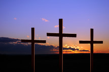 Three crosses at sunset.