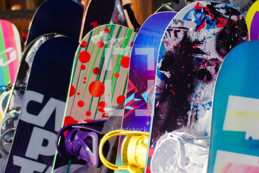 a row of snowboards 