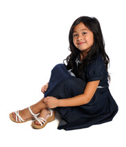 Young girl sitting on the floor