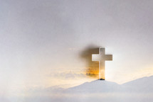 Silhouette of christian cross on mountain hill background. Copy space. Faith symbol. Church worship, salvation concept. Faith symbol in Jesus Christ. Holy cross for Easter day. 
