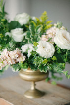 centerpiece, flowers in a vase on a table 