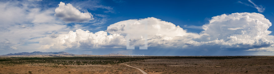 Long cloud pano over the desert