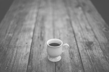 coffee mug on a wood table