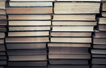 stacked books background 