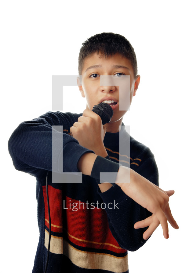 Young boy singing a hip-hop song