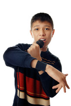 Young boy singing a hip-hop song