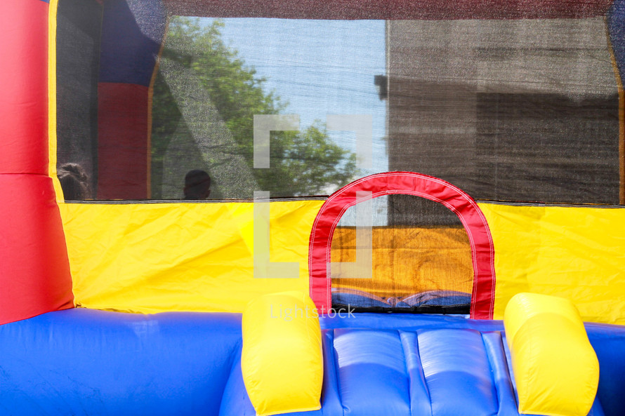 children in a bounce house 