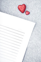 red hearts and lined paper 