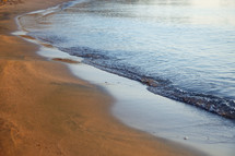 tide washing onto a shore 