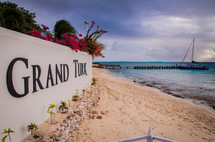 Grand Turk sign on a beach 