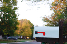 a mailbox in front of a house 