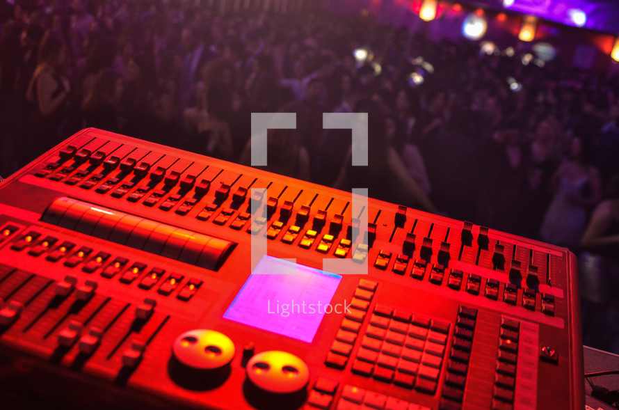soundboard and crowds at a concert 