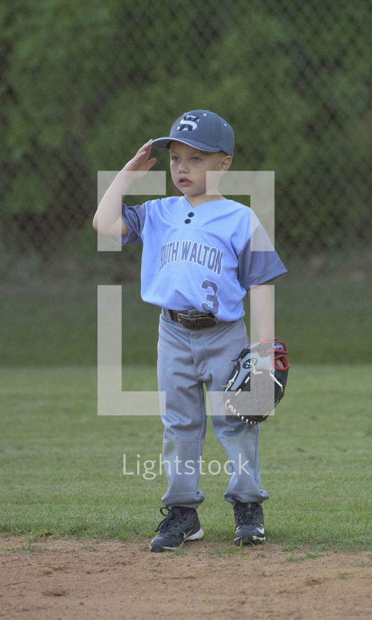 a child on a baseball field 
