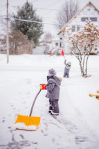 a boy playing in snow 