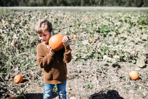Children at a pumpkin patch 