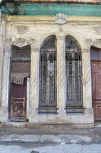 ornate bars over windows 