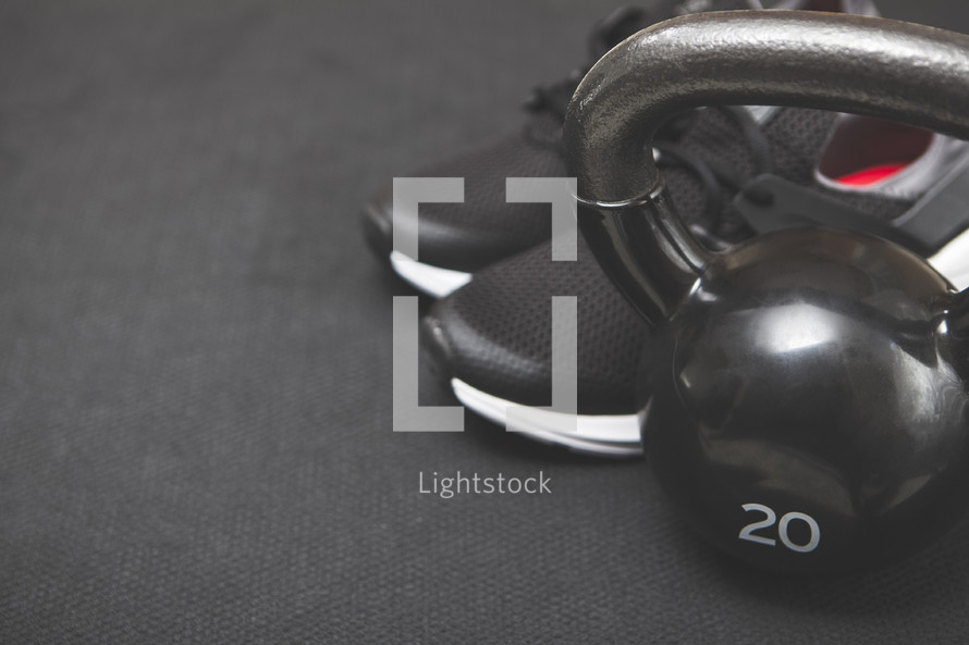 kettle bell weight and sneakers 