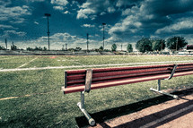 Bench on a football field.