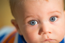 an infant boys blue eyes