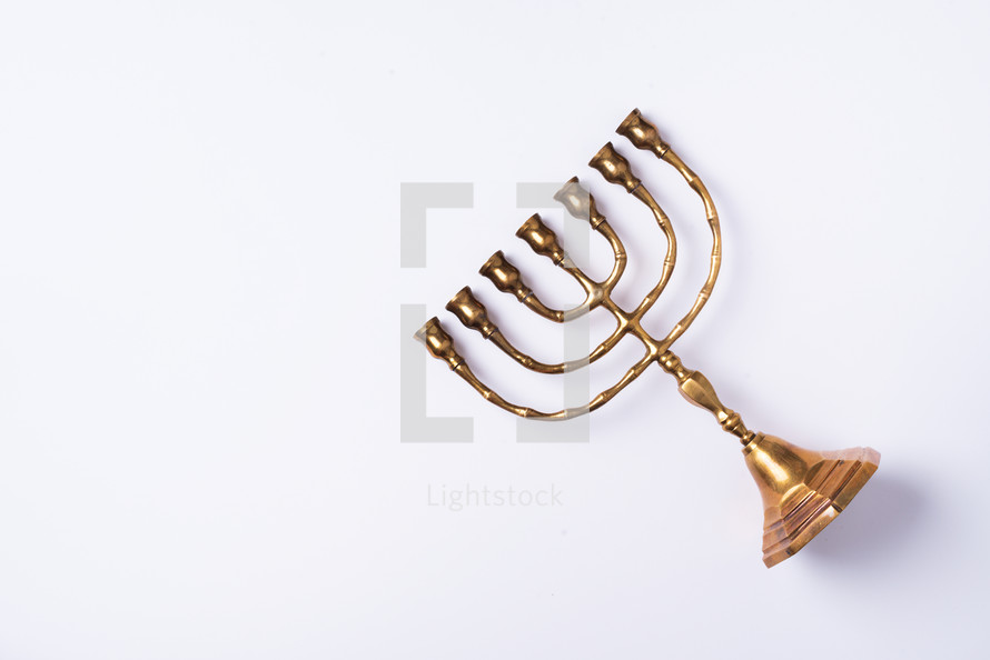 Golden hanukkah menorah. Jewish holiday banner with copy space. Ancient ritual religious candle menorah.