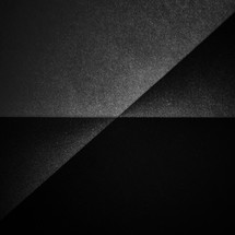 Minimal black texture background made of paper