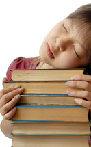 young student sleeping on the numerous books