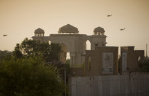 Sunset in Baghdad with helicopters