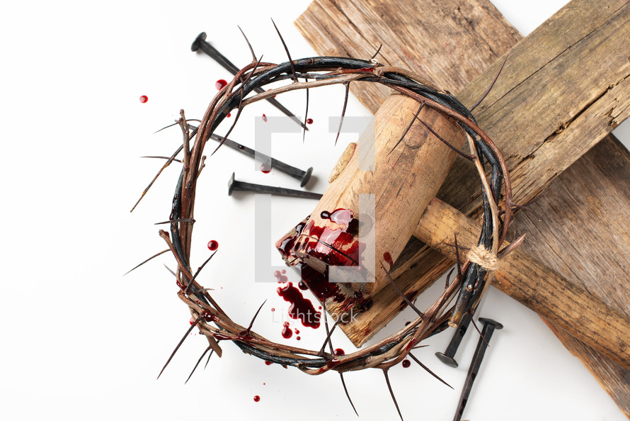 Bloody nails, crown of thorns with drops of blood over white background. Good Friday, Passion of Jesus Christ. Christian Easter holiday. Crucifixion, resurrection of Jesus Christ. Gospel, salvation