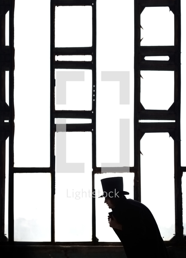 man in a top hat 