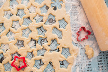 star shaped cookies cut out of dough 