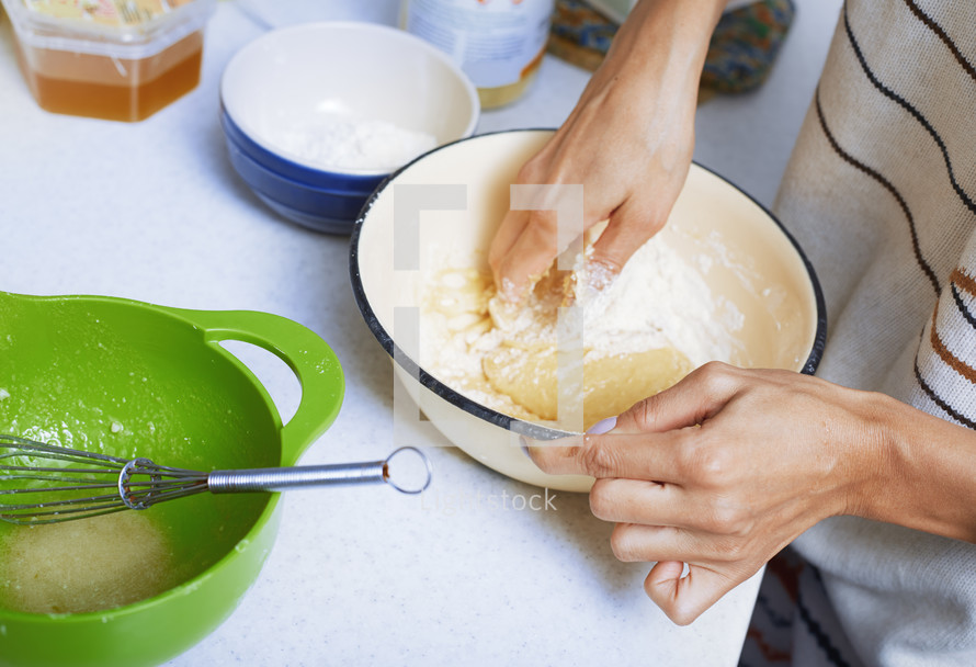 mixing batter in a bowl 
