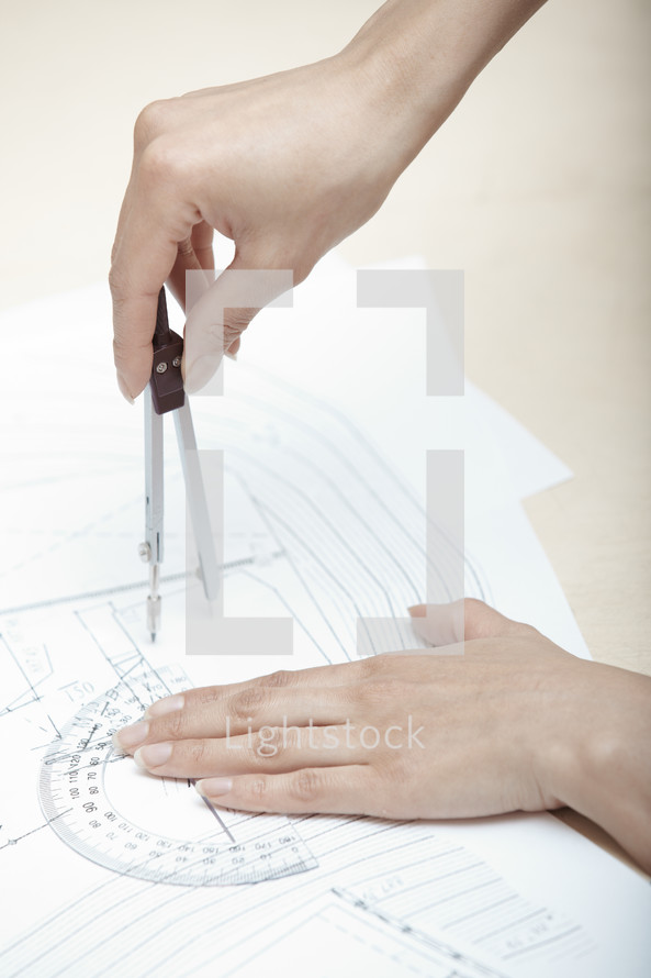 woman using a protractor 