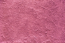 pink textured wall background 