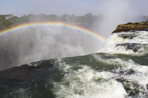 rainbow over a waterfall 