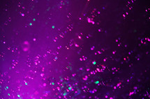 bubbles in purple spotlights 
