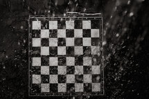 Chessboard under the rain