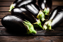 Fresh homemade eggplant on the table. On a wooden background. High quality photo