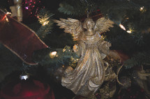 angel ornament on a Christmas tree