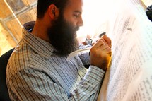Rabbi hand-writing the Torah