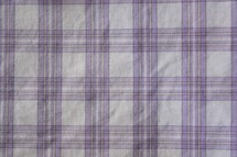 purple and white plaid fabric background 